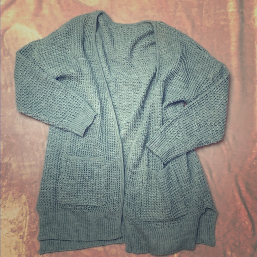 Soft gray open cable knit sweater